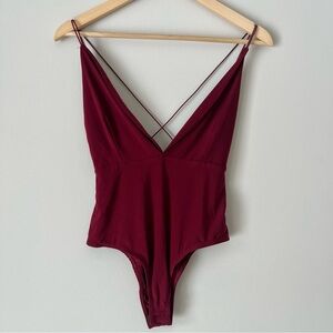 MISSGUIDED Burgundy Red Plunge Neckline Strappy Bodysuit - Size Medium